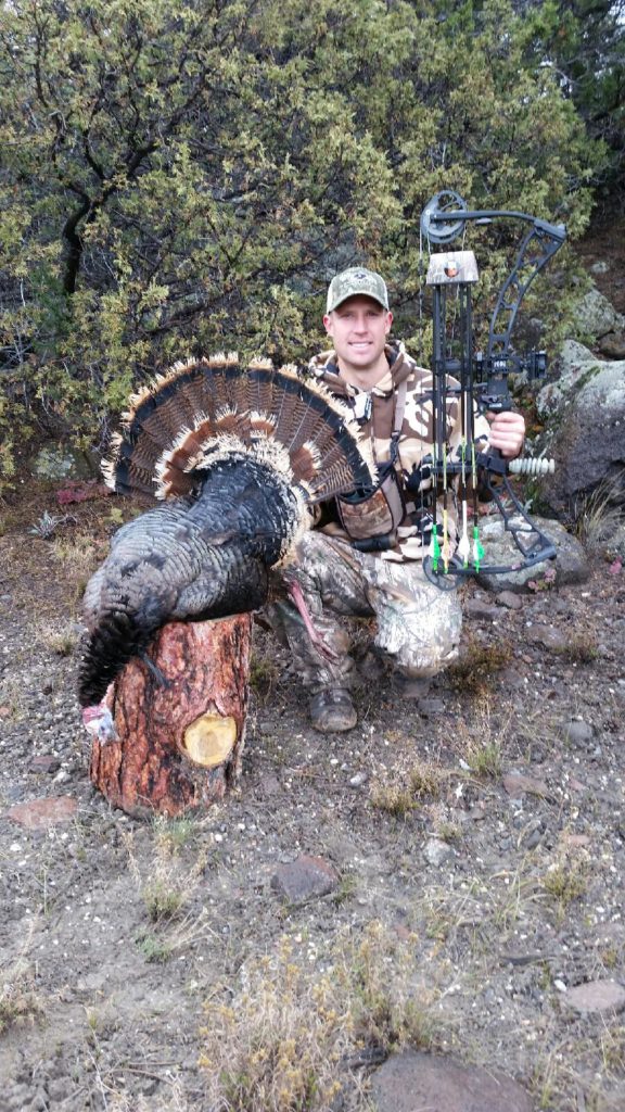 Bo Fowler proudly displays his Tom turkey.