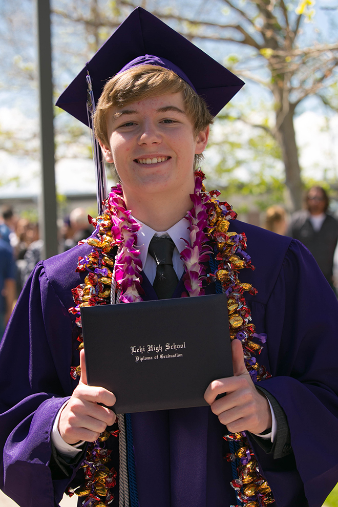 Bowen Revill proudly displays his diploma. Photo: Kaye Collins