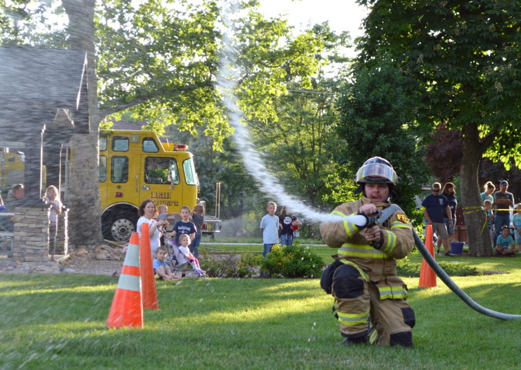 Spanish Fork firefighter competes in the muster. Photo: Nicole Kunze