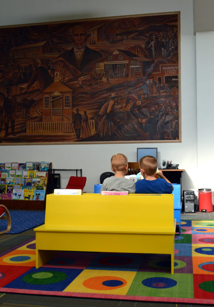 Children reading at the Literacy Center. Photo: Nicole Kunze