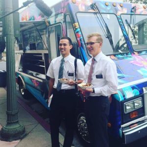 Missionaries from the LDS Church come help the Lei-Away Leidies sell their food. Photo courtesy of Carey Ofahengaue